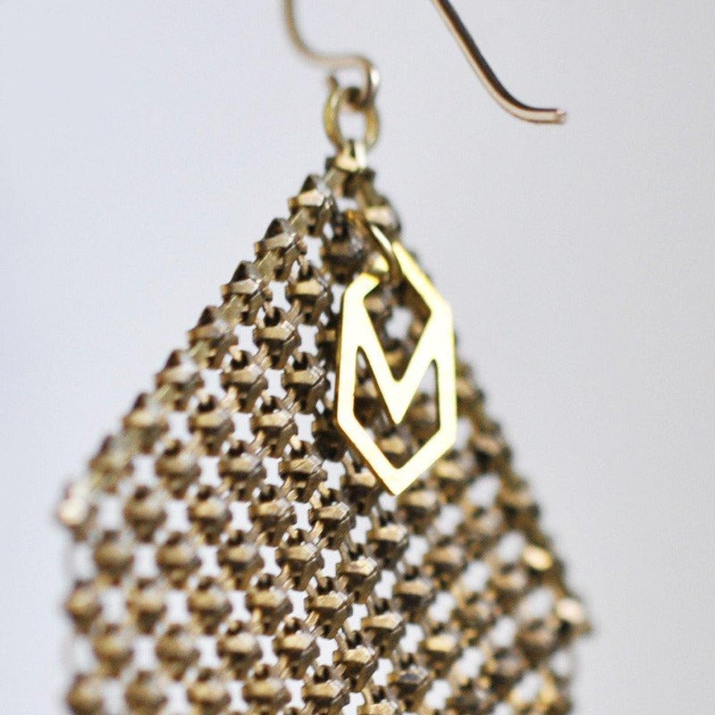 Logo signature tag on Maral Rapp earring made from recycled vintage metal mesh