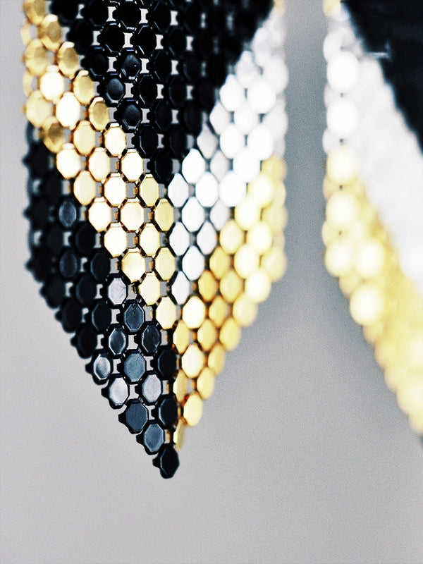 Deco Glam Eye Mesh Earrings, mod geometric pattern hand-pieced with gold, silver, and black mesh reclaimed from three vintage purses. by Maral Rapp