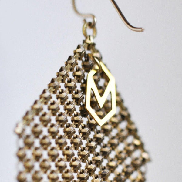 Logo tag detail, handmade earrings with metal mesh recycled from vintage and antique metal mesh purses. by Maral Rapp, Modern Vintage Mesh Works